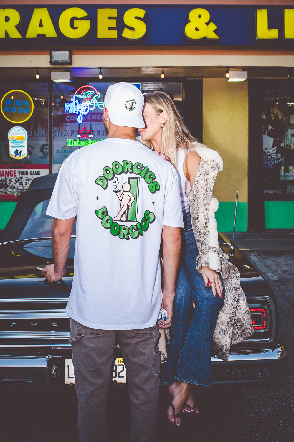 white streetwear tee nightlife fashion with matching white snapback hat